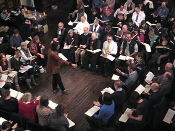 Jesse P. Karlsberg, Aaron Kahn of Paris, France, leads a song at the first Ireland Sacred Harp Convention, Cork, Ireland, March 6, 2011.