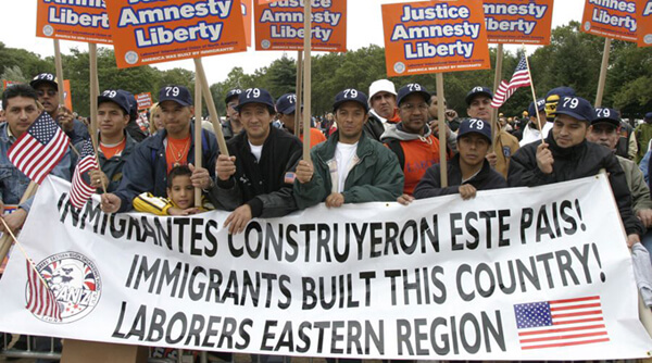 Stan Schnier, Immigrant workers at the final celebration of the Immigrant Workers Freedom Ride, Flushing Meadows Corona Park, New York, New York, October 4, 2003.  