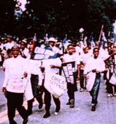 Bud Billiken parade in "simulated newsreel," from Goin' to Chicago, 2000.