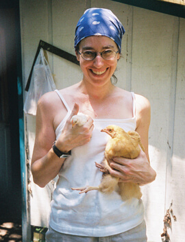 Bill DeLoach, Allison Adams with two of her first chicks, Isabel and Josephine, Decatur, Georgia, July 2004. 