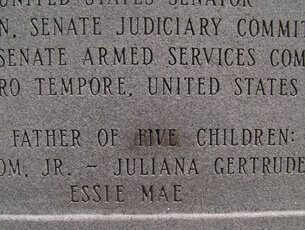 Ranee Saunders, Detailed image of altered text on Thurmond statue, Columbia, South Carolina, 2010.