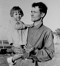 Russell Lee, Library of Congress, Prints & Photographs Division FSA-OWI Collection Reproduction Number: LC-USF33-011882-M5 DLC, Cajun farmer with daughter, Near New Iberia, Louisiana, 1938.