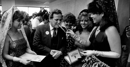 Donn Dughi, Representative Elvin Martinez with Latin princesses and a cigar, Tallahassee, Florida, April 30, 1987. Catalog no.: Dnd0457. Florida Photographic Collection.