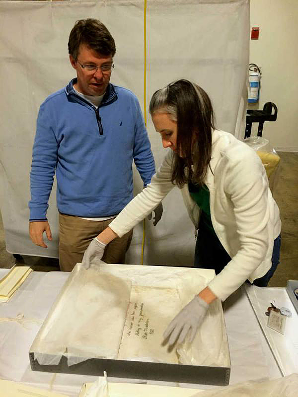 Curators Tracey Todd, Chief Operating Officer of Middleton Place Foundation, and Andrea Jain, of the Smithsonian Institution, examine Ashley's Sack, 2016. Photograph courtesy of the Middleton Place Foundation.