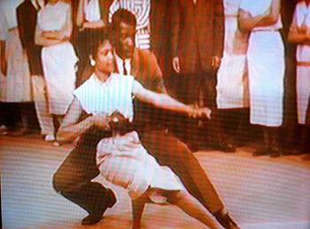 Vera Boyer and Otis Givens show off their dance steps on The Mitch Thomas Show, Wilmington, Delaware, ca. 1956-57. Screen shot from 