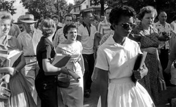 Hazel Bryan (left) harasses Elizabeth Eckford as Eckford and other black students attempt to integrate Little Rock's Central High School, Little Rock, Arkansas, September 4, 1957. Courtesy of Matthew F. Delmont.