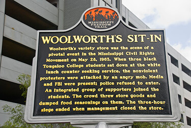 Woolworth's Sit-In Historic marker, a plaque in downtown Jackson, Mississippi, dedicated May 28, 2013. Photograph by Ron Cogswell. Courtesy of Ron Cogswell. CC BY 2.0