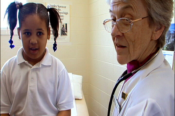 Sister Manette with a patient, Bodies and Souls, 2005. Screenshot by Southern Spaces.
