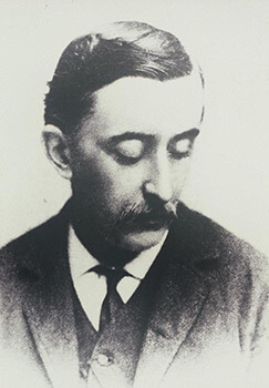 Portrait of Lafcadio Hearn, 1889. Photograph by Fredrick Gutekunst. From The Lafcadio Hearn Library, University of Toyama Central Library. 