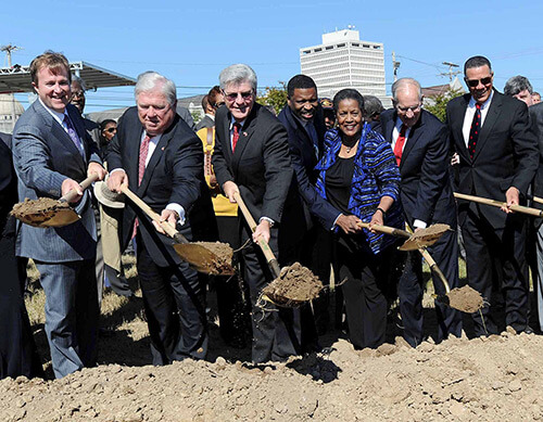Breaking ground on the Mississippi History and Civil Rights Museums, October 24, 2013. Included in the shovel line, from left, are Entergy Mississippi president Haley Fisackerly, former Governor Haley Barbour, Governor Phil Bryant, state NAACP president Derrick Johnson, former NAACP chair Myrlie Evers, former Governor William Winter, and former state Supreme Court Justice Reuben Anderson. Photograph courtesy of Mississippi Department of Archives and History.