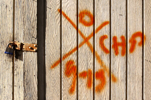 X-Code and Padlock, French Quarter, New Orleans, Louisiana, March 21, 2006. Photograph by Paul Conlan. © Paul Conlan.