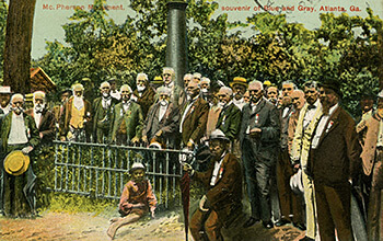 Blue-Gray reunion at the McPherson Monument, Albert Shaw, center-forward, with umbrella. July 1900. Illustration.