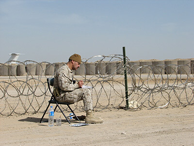 Michael D. Fay at work at a big airbase called TQ (Al-Taqaddum), Iraq, March 2006. Photograph courtesy of the artist.