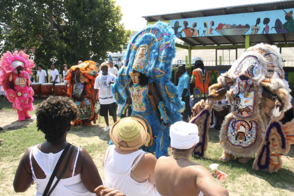 Colorfully costumed Mardi Gras Indians at Maafa 2011.