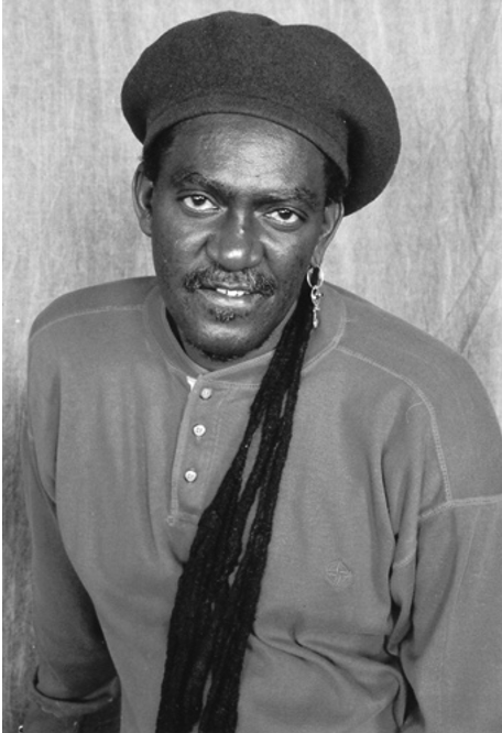 Black and white portrait photo of Douglas Redd as a young man.